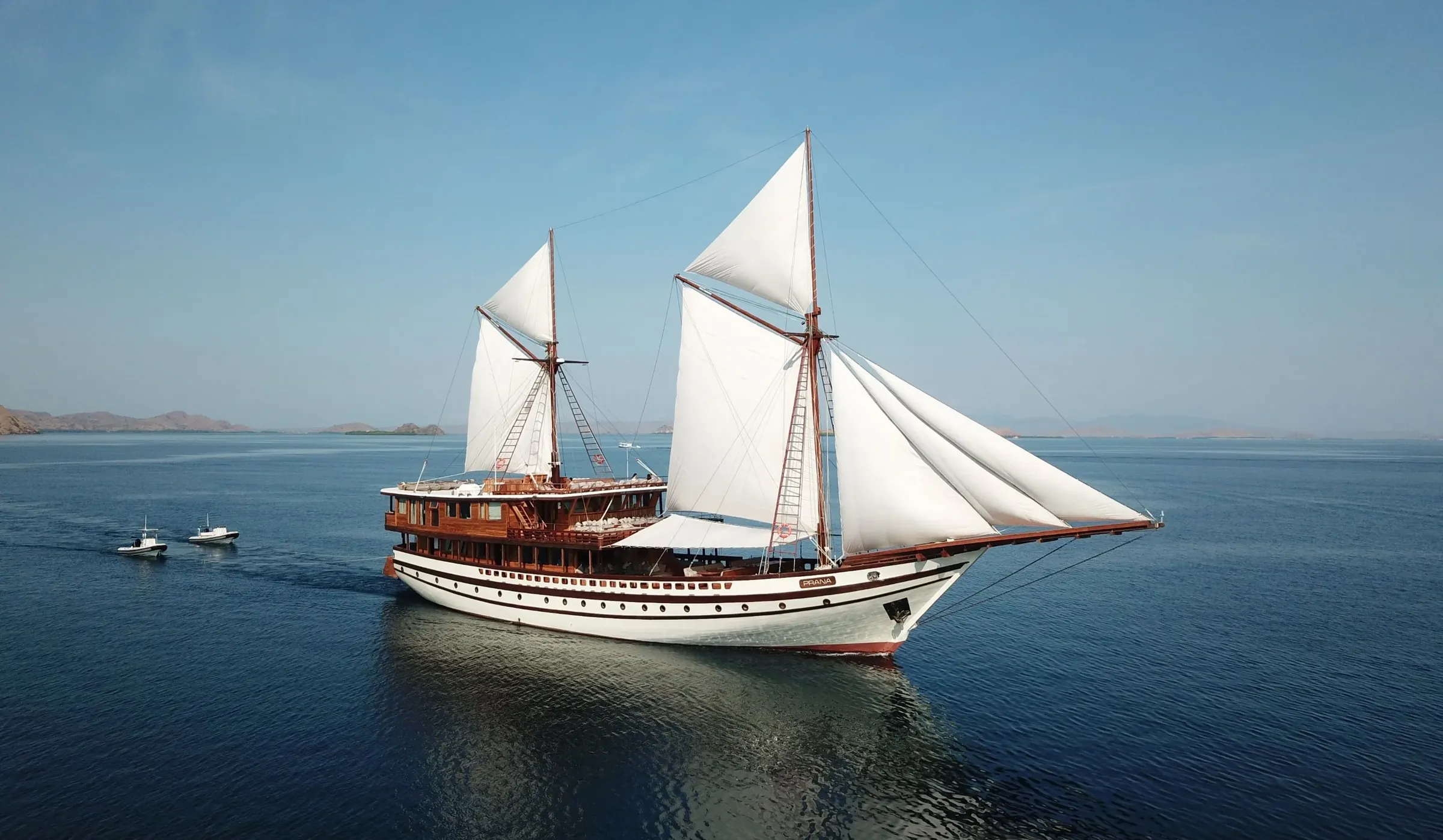 Prana under full sail on a calm sea